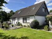 Bild 3 - 7 Zimmer Mehrfamilienhaus, Wohnhaus in Tetenhusen