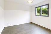 Schlaf-/ Arbeitszimmer EG - 
