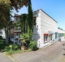 Wohn- und Geschäftshaus mit Produktionsfläche und großer Wohnung in Stuttgart-Hallschlag