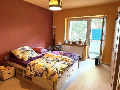 Schlafzimmer mit Balkonzugang - 
