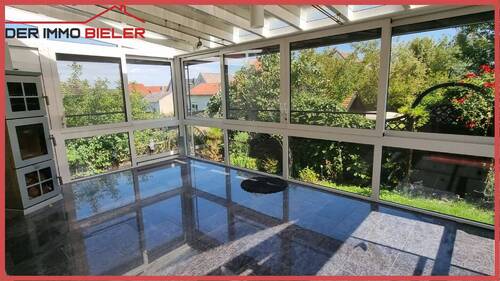 Wintergarten mit Kaminofen - 