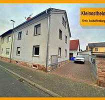 Zweifamilienhaus mit Scheune, Garage + 2 Kfz-Stellplätze und Garten mit überdachter Lounge - Kleinostheim
