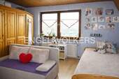 Schlafzimmer in der Wohnung im Dachgeschoss - 