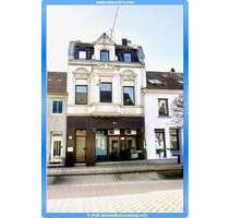 Gepflegtes Wohn-Geschäftshaus mit großem LadenlokalGewerbeeinheit - Rheinberg