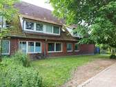 Gartenansicht - Provisionsfreies Mehrfamilienhaus auf Erbpachtgrundstück, ein Angebot der Gerd von der Heide Immobilien GmbH