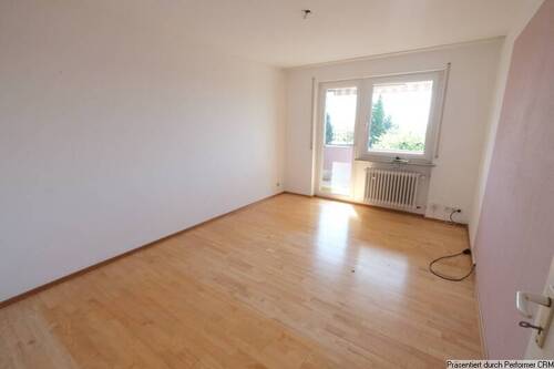 Kinderzimmer 1 mit Zugang zum Balkon - 