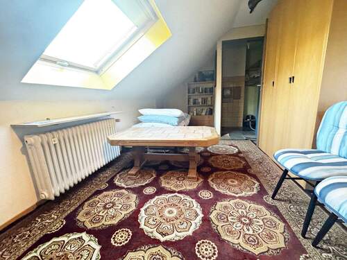 Zimmer im Dachgeschoss - 