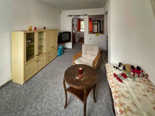 Einliegerwohnung Wohnzimmer - 7 Zimmer Einfamilienhaus zum Kaufen in Schömberg