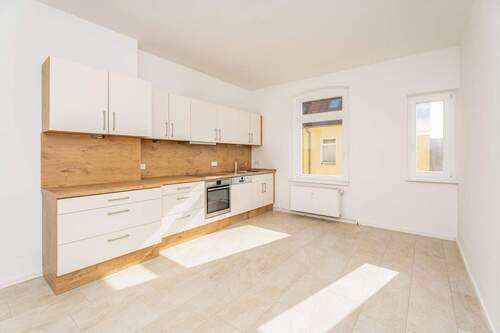 Große Wohnküche mit Einbauküche - 