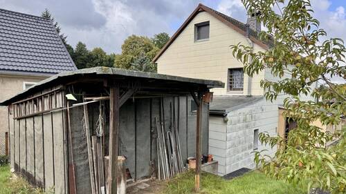 Ansicht mit Schuppen - 