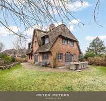 Großzügige Haushälfte unter Reet mit Einzelhauscharakter in Kampen