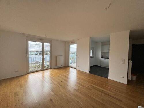 Wohnbereich mit Blick zum Küchenbereich - Etagenwohnung mit 79,40 m&sup2; in Erlangen zur Miete