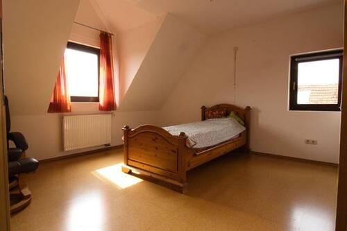 Schlafzimmer im Dachgeschoss - 