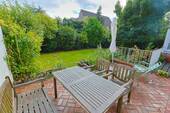 Terrasse - Stadtleben trifft Gartenruhe - 4-Zimmer-Wohnung mit 250?m² Garten und 189 m² Wohn-Nutzfläche