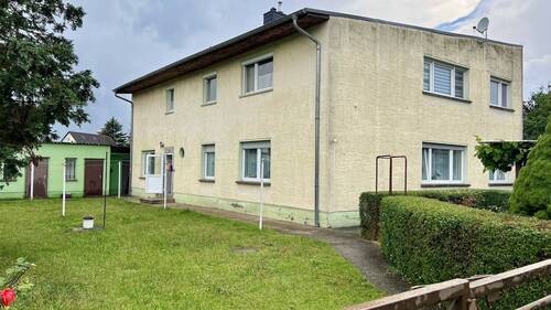 Bild 2 - 8 Zimmer Mehrfamilienhaus, Wohnhaus zum Kaufen in Coswig