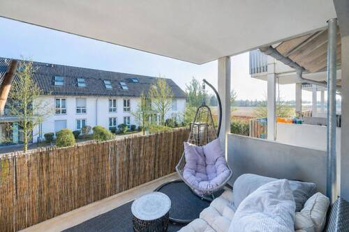Balkon mit Suedausrichtung - AIGNER - Raum für Lebensträume - Moderne 3-Zimmer-Wohnung mit Balkon in Salmdorf