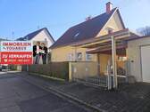 Einfamilienhaus zu verkaufen - Freistehendes Einfamilienhaus mit Einfahrt zur Garage, Carport, Balkon, Garten, Keller in Ottweiler