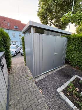 Vorgarten - Gerätehaus - Reihenmittelhaus mit 107,00 m&sup2; in Nidderau zum Kaufen