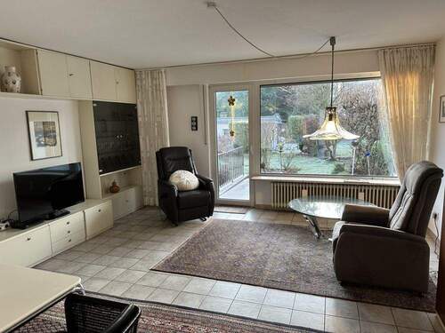 Wohnzimmer mit Terrasse - 5 Zimmer Reihenmittelhaus zum Kaufen in Gelsenkirchen