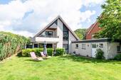 Garten / Terrasse - Familienfreundliches Haus mit Garten, Loggia und Garage