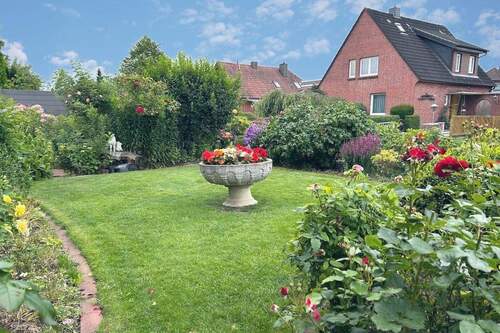 Garten - 4 Zimmer Mehrfamilienhaus, Wohnhaus zum Kaufen in Wangerland
