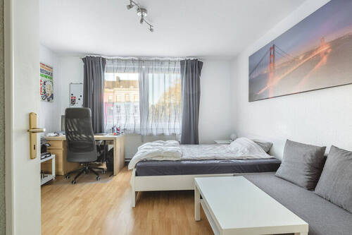 Wohn-Schlafbereich der rechten Wohnung im 1. OG - 
