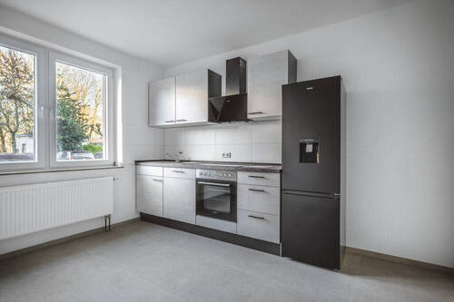 Küche der rechten Erdgeschosswohnung - 
