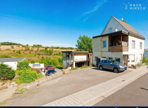 Aussenansicht - 2 Fam.-Haus + Werkstatt + Baugrundstück *Teil-Vermieten*