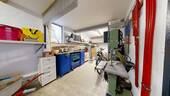 Werkstatt hinter Unterstand / Büro - 