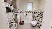 EG Gäste WC mit Waschmaschinenanschluss - 