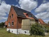 Seitenansicht vom Garten - 7 Zimmer Einfamilienhaus zum Kaufen in Dannenberg