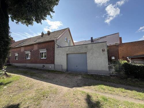 komplette Vorderansicht mit Garage - Einfamilienhaus mit 93,00 m² in Lutherstadt Wittenberg zum Kaufen