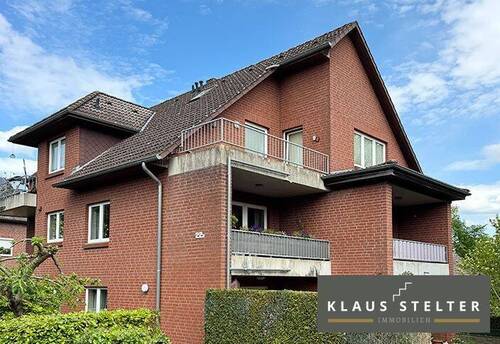 Das Mehrparteienhaus - 2-ZIMMER-DACHGESCHOSS-WOHNUNG MIT BALKON