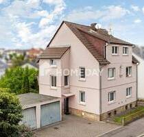 Gepflegtes 3-Familienhaus mit 245 m² Wohnfläche, Scheune, Garagen und Garten in Petersberg