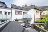 Außenansicht - Familienfreundliches Reihenmittelhaus mit kleinem Garten in ruhiger Wohnlage