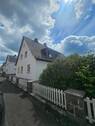 Seitenansicht - 7 Zimmer Mehrfamilienhaus, Wohnhaus zum Kaufen in Bad Endbach