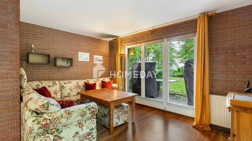 Wohnzimmer 1 - Wohnen zwischen Natur und Komfort - Drei-Zimmer-Wohnung mit Terrasse und Ostseeblick