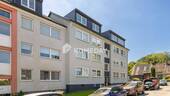 Außenansicht 3 - Gepflegte 3-Zimmer-Hochparterrewohnung mit Balkon in angenehmer Wohnlage