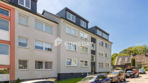 Außenansicht 3 - Gepflegte 3-Zimmer-Hochparterrewohnung mit Balkon in angenehmer Wohnlage