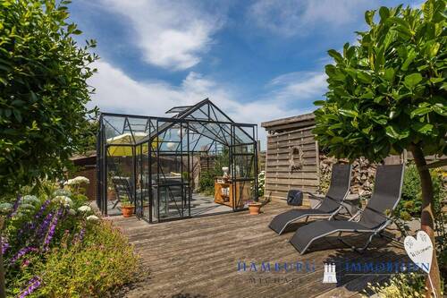 Gewächshaus mit Sitzlätzen - 