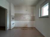 Küche mit Zugang zum Abstellraum - Etagenwohnung mit 87,00 m&sup2; in Herzogenaurach zum Kaufen