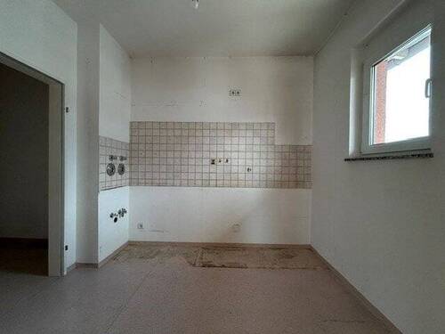 Küche mit Zugang zum Abstellraum - Etagenwohnung mit 87,00 m&sup2; in Herzogenaurach zum Kaufen