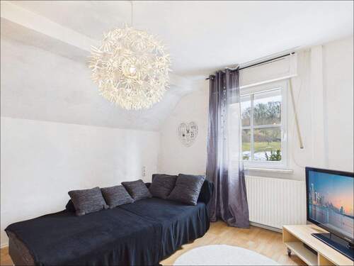 Wohnzimmer - 8 Zimmer Einfamilienhaus in Goldbach / Unterafferbach