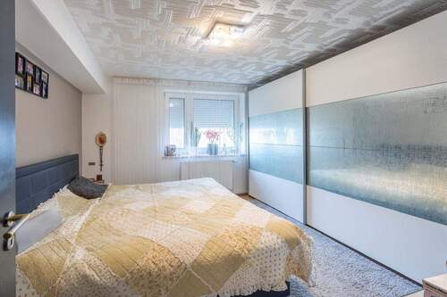 Schlafzimmer - Terrassenwohnung mit 60,00 m&sup2; in Traunreut zum Kaufen