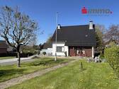 Frontansicht - Freistehendes Einfamilienhaus mit Garage in zentraler Lage