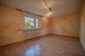 Wohnzimmer - 3 Zimmer Einfamilienhaus zum Kaufen in Mannheim