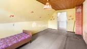 1. OG Schlafzimmer 2 - 