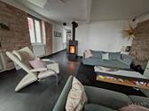 EG Wohnbereich mit Kaminofen - 6 Zimmer Etagenwohnung zum Kaufen in Heidelberg