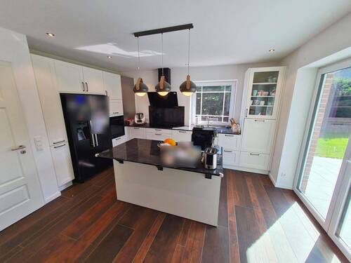 Kochbereich mit moderner Einbauküche - 