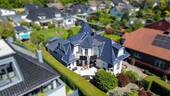 Außenansicht - Architektur-Highlight: Viel Platz für Familie, Wellness & Business